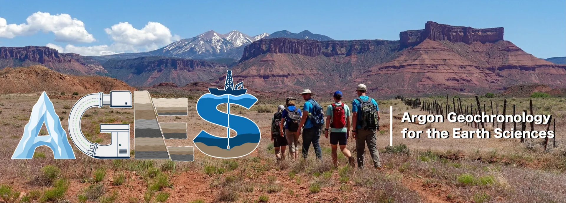 Canyons and mountains of the Paradox Basin in the background. Lab members walking with the rest of the field team in the foreground. Lab logo is overlain!