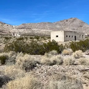 ghost town with hills in background
